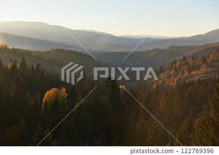 Beautiful autumn morning on the view point above the deep forest valley in Carpathians, Ukraine, Europe 122769396