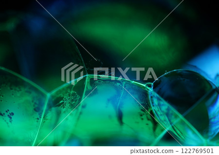 Blue and Green bubbles reflections on black background, liquid abstraction, colour waves, deep dark backgrounds, multicoloured glossy surface Blue and Green bubbles reflections on black background, liquid abstraction, colour waves, deep dark backgrounds, multicoloured glossy surface 122769501