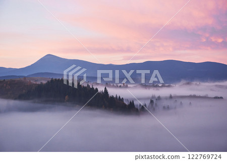 Foggy morning in the Ukrainian Carpathian Mountains in the autumn season 122769724