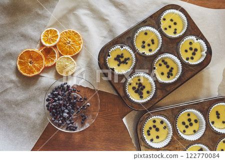 Making muffins and molding in molds 122770084