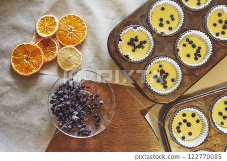 Making muffins and molding in molds Making muffins and molding in molds 122770085