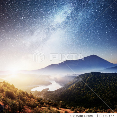 Mountain beautiful landscape with river views, vibrant night sky Mountain beautiful landscape with river views, vibrant night sky 122770377