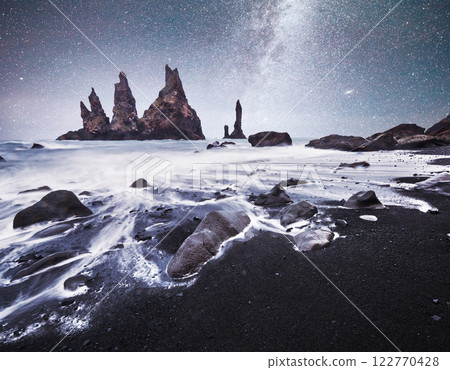 Icebergs floating in Jokulsarlon glacial lake. South Iceland. Lagoon. Starry sky night. Fantastic milky way. Icebergs floating in Jokulsarlon glacial lake. South Iceland. Lagoon. Starry sky night. Fantastic milky way. 122770428