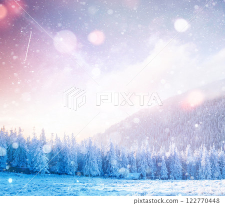 Mysterious winter landscape majestic mountains in winter. Magical winter snow covered tree. Photo greeting card. Bokeh light effect, soft filter. Mysterious winter landscape majestic mountains in winter. Magical winter snow covered tree. Photo greeting card. Bokeh light effect, soft filter. 122770448