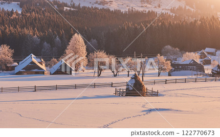 winter landscape trees and fence in hoarfrost, background with  snow flakes 122770673