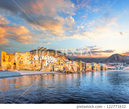 Picturesque evening cityscape of Cefalu city. Popular travel destination of Mediterranean sea. 122771632