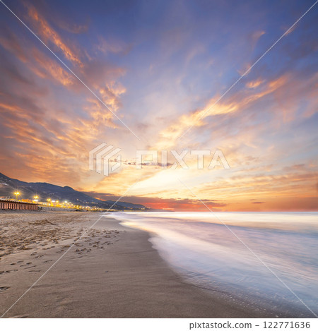 Beautiful evening landscape on the beach of Cefalu city. Beautiful evening landscape on the beach of Cefalu city. 122771636