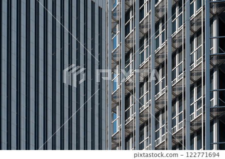 modern skyscrapers with reflective glass and steel building exterior, contemporary architecture of big city 122771694