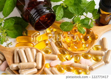 Alternative medicine herbal organic capsule, mineral, drug with herbs leaf natural supplements for healthy good life. Alternative medicine herbal organic capsule, mineral, drug with herbs leaf natural supplements for healthy good life. 122773417