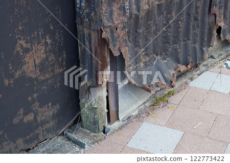 Decaying tin wall Decaying tin wall 122773422