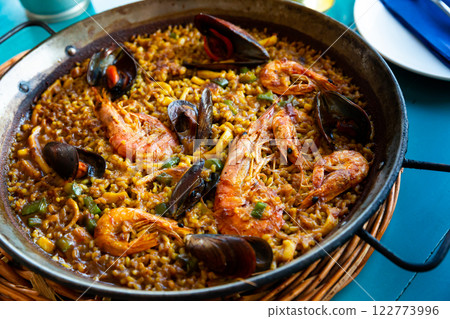 Paella in frying pan 122773996