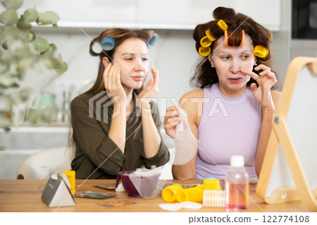 Adult and young women use face masks 122774108