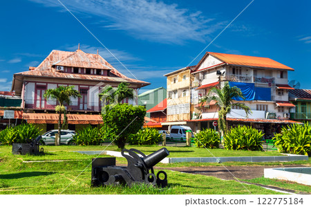 Traditional houses at Place du Coq in Cayenne, the capital of French Guiana 122775184