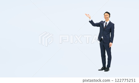 Full-body photo of a middle-aged male business person giving a presentation Full-body photo of a middle-aged male business person giving a presentation 122775251
