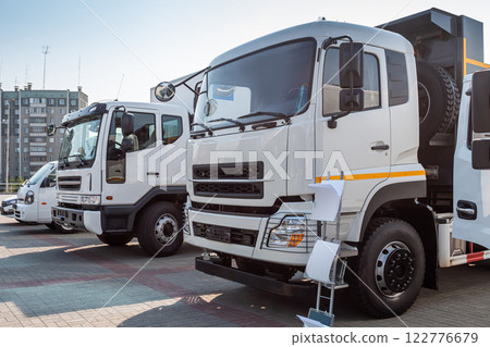 White modern trucks at an industrial exhibition 122776679