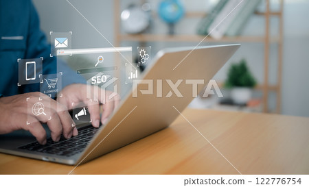 SEO Concept search engine optimization, Businessman using computer to show SEO on website for search engine ranking or SEO, AI Assistant search on screen, Marketing information technology. 122776754