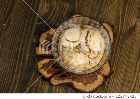 balls of creamy ice cream with the addition of natural maple syrup balls of creamy ice cream with the addition of natural maple syrup 122778423