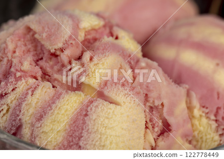 cold natural ice cream with different flavors close up 122778449