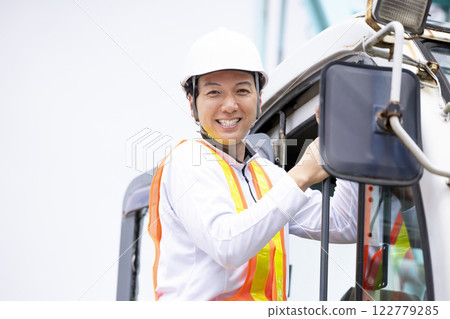Workers working at a construction site Workers working at a construction site 122779285