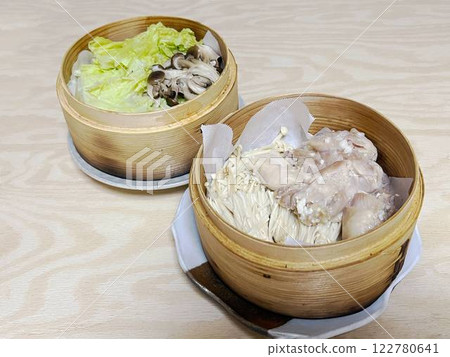 Steamed meat, mushrooms and vegetables Steamed meat, mushrooms and vegetables 122780641