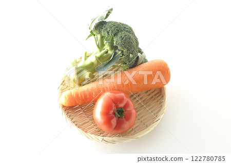Tomatoes, carrots and broccoli photographed on a white background Tomatoes, carrots and broccoli photographed on a white background 122780785