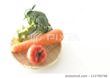 Tomatoes, carrots and broccoli photographed on a white background Tomatoes, carrots and broccoli photographed on a white background 122780786