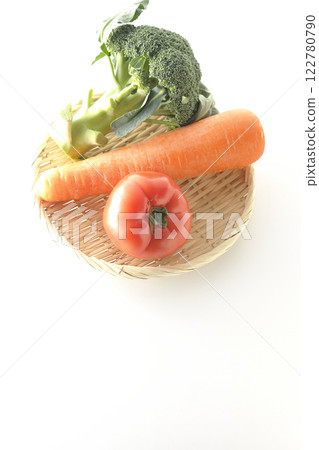 Tomatoes, carrots and broccoli photographed on a white background Tomatoes, carrots and broccoli photographed on a white background 122780790