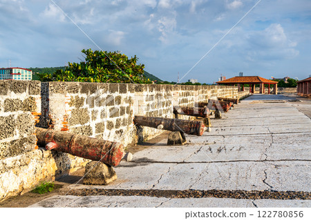 Old cannons on historic defensive wall surrounding the center of Cartagena, Colombia, South America 122780856