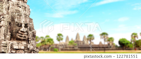 Horizontal banner with stone face in Prasat Bayon Temple. Famous landmark Angkor Wat complex, khmer culture, Siem Reap, Cambodia. Topic of vacation, travel, trip abroad on vacation, cruises and tours 122781551