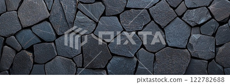 Dark grey stone wall texture creating modern and elegant background Dark grey stone wall texture creating modern and elegant background 122782688