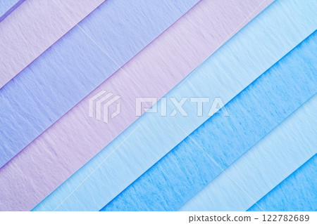 Diagonal stripes creating textured blue and purple pattern background Diagonal stripes creating textured blue and purple pattern background 122782689