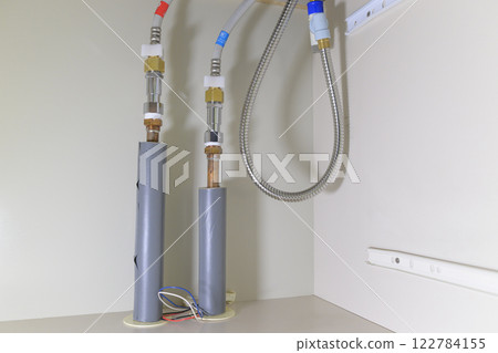 Faucet piping after replacement due to water leakage (before and after material of fitting replacement version) Faucet piping after replacement due to water leakage (before and after material of fitting replacement version) 122784155