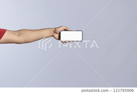 Hand with cell phone isolated, hand showing cell phone isolated, one hand showing cell phone screen isolated Hand with cell phone isolated, hand showing cell phone isolated, one hand showing cell phone screen isolated 122785006