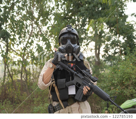 Team of U.S. Army marine corps soldier military war with gun weapon participating and preparing to attack the enemy in Thailand during exercise Cobra Gold training in battle. Combat force. 122785193