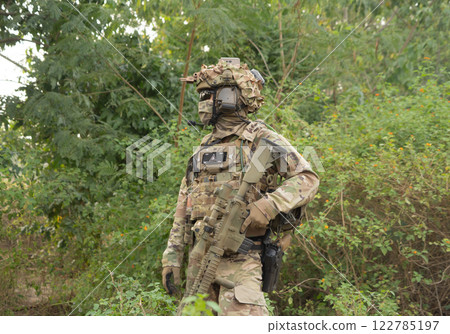 Team of U.S. Army marine corps soldier military war with gun weapon participating and preparing to attack the enemy in Thailand during exercise Cobra Gold training in battle. Combat force. 122785197