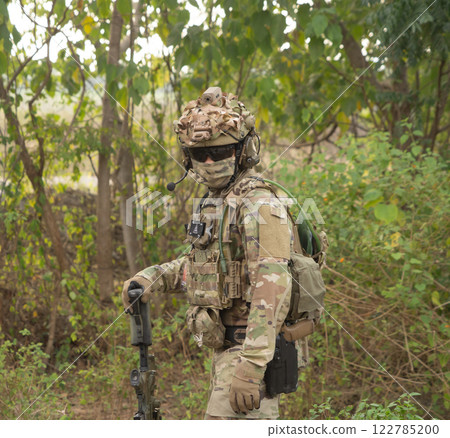Team of U.S. Army marine corps soldier military war with gun weapon participating and preparing to attack the enemy in Thailand during exercise Cobra Gold training in battle. Combat force. 122785200