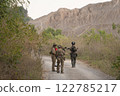 Team of U.S. Army marine corps soldier military war with gun weapon participating and preparing to attack the enemy in Thailand during exercise Cobra Gold training in battle. Combat force. 122785217