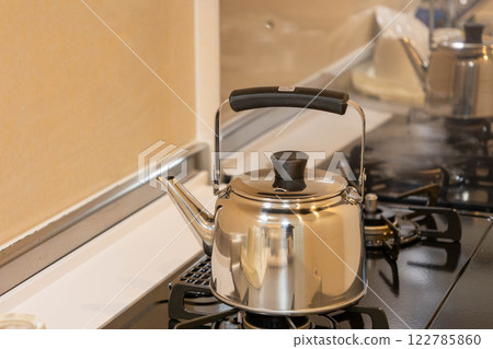Kitchen with gas stove Kitchen with gas stove 122785860