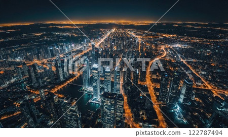 aerial view of a city at night, with a vast network of illuminated streets and towering skyscrapers. The bright lights of the cityscape stretch far into the distance, creating a vibrant and futuristic aerial view of a city at night, with a vast network of illuminated streets and towering skyscrapers. The bright lights of the cityscape stretch far into the distance, creating a vibrant and futuristic 122787494