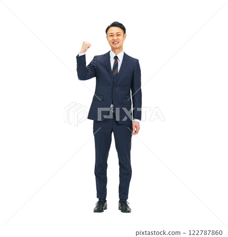 Middle-aged male business person doing a fist pump. Full-body photo PNG with transparent background precisely cut out by hand. 122787860