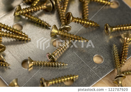a set of metal products for construction and fastening work a set of metal products for construction and fastening work 122787920