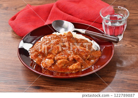 Spicy chicken curry, curry rice. 122789887