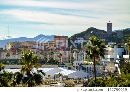 Cannes beach and castle, buildings and palm trees, France 122790039