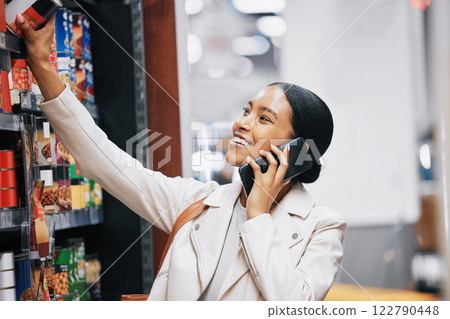 Happy supermarket, grocery shopping and customer with 5g phone, smile and in retail store for food, groceries or product from shelf. Woman with smartphone, communication of sale and on call in shop Happy supermarket, grocery shopping and customer with 5g phone, smile and in retail store for food, groceries or product from shelf. Woman with smartphone, communication of sale and on call in shop 122790448