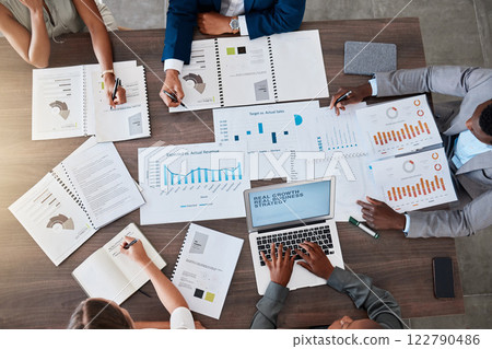 Meeting, planning and finance with a team of business people discussing a report, contract or paper document. Above teamwork or conversation in boardroom meeting for strategy, growth and development Meeting, planning and finance with a team of business people discussing a report, contract or paper document. Above teamwork or conversation in boardroom meeting for strategy, growth and development 122790486