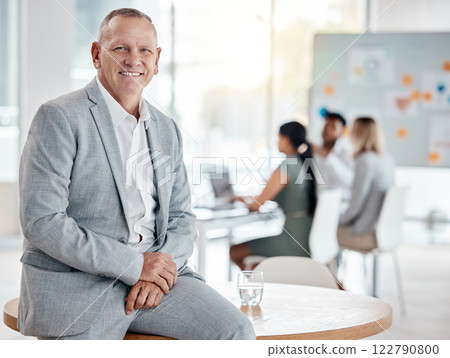 Portrait, happy business man or ceo in office on table for motivation, inspiration and vision with a smile. Boss, leader or executive with plan for innovation, strategy and future success planning. Portrait, happy business man or ceo in office on table for motivation, inspiration and vision with a smile. Boss, leader or executive with plan for innovation, strategy and future success planning. 122790800