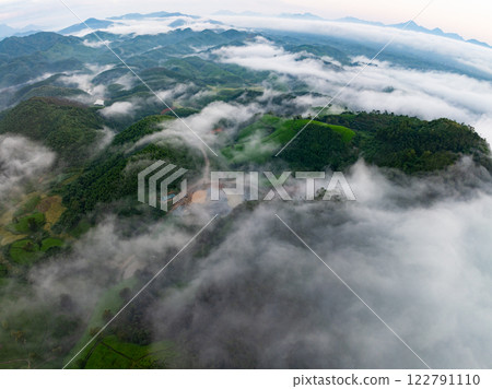 Drone aerial view of landscape fog over mountains in sunrise sky,High angle view over countryside at northern Vietnam,Wide angle view 122791110