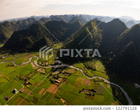 Drone aerial view of landscape mountains view in sunset or sunrise time,High angle view image over countryside at northern Vietnam 122791128