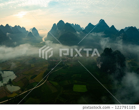 Drone aerial view of landscape mountains view in sunset or sunrise time,High angle view image over countryside at northern Vietnam Drone aerial view of landscape mountains view in sunset or sunrise time,High angle view image over countryside at northern Vietnam 122791185