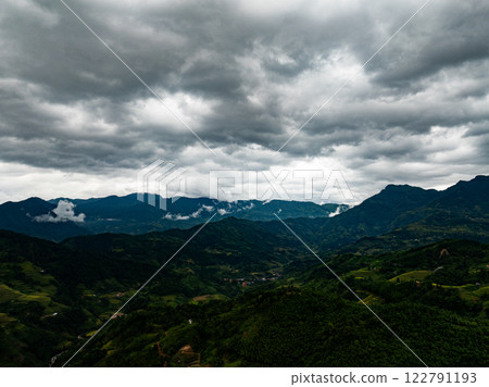 Drone aerial view of landscape mountains view in sunset or sunrise time,High angle view image over countryside at northern Vietnam Drone aerial view of landscape mountains view in sunset or sunrise time,High angle view image over countryside at northern Vietnam 122791193